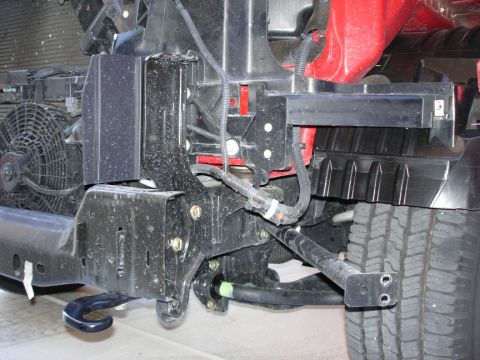 2005 Nissan Titan - Front bumper assembly and tow hook on a 2005 Nissan Titan.