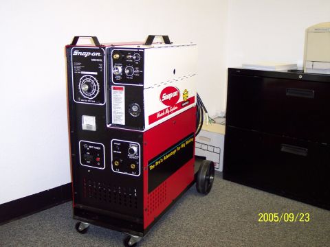 1985 Ford Bronco - Snap-on MM250SL MIG welder is shown with its control panel and wheels.