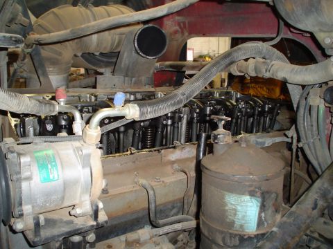 1966 International School Bus - Engine components visible, including air intake, fuel system, and a filter canister.
