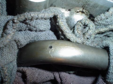 1966 International School Bus - A close-up view of a damaged engine bearing, partially obscured by fabric.