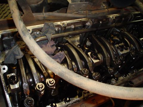 1966 International School Bus - Engine valve train components, including rocker arms and springs, are shown in this close-up view.
