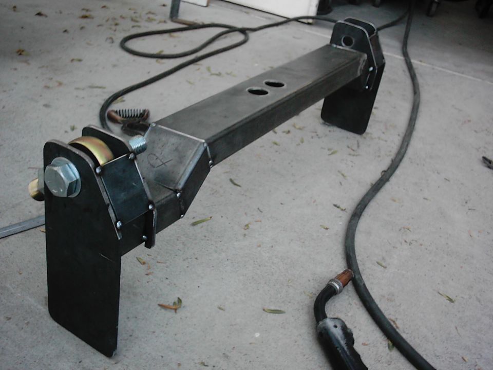 Custom trailer hitch receiver with large bolt and metal plates