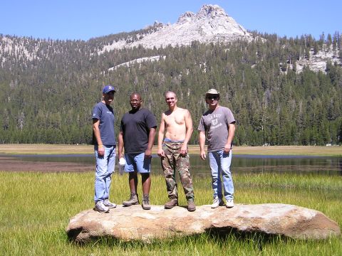 1989 Ford Bronco - A group of friends enjoy a scenic view during a trip to the mountains.