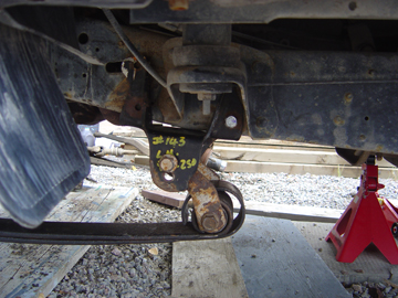 1986 Ford F-150 - Suspension component with handwritten numbers '32 143 L.M. 250' visible.