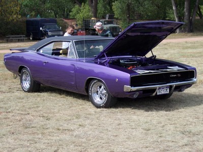 1972 Ford Ranchero - Purple 1968 Dodge Charger at a car show, with hood open revealing the engine bay.
