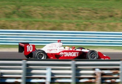 1979 Ford F-150 - A race car with Target sponsorship drives on a track, number 10 visible on the rear wing.