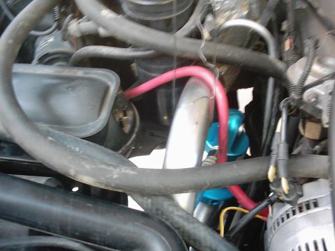 1978 Ford Bronco - Engine bay details with various hoses and electrical components visible.