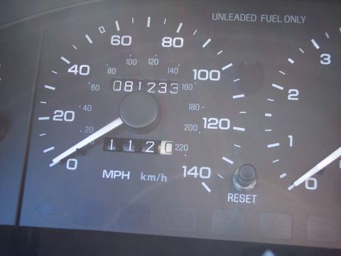 1995 Ford Probe - Close-up of a car's dashboard gauges, including the speedometer and odometer.