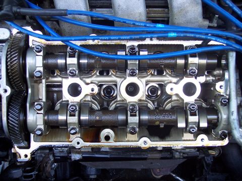 1995 Ford Probe - The internal components of an engine are visible after the valve cover has been removed.