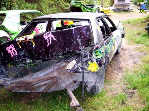 1987 Mercury Grand Marquis - This sedan has been severely damaged, likely from a demolition derby event.