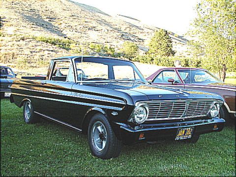1967 Ford Ranchero - Black 1966 Ford Falcon Ranchero with a maroon car in the background.