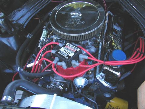 1967 Ford Ranchero - Close-up view of a modified engine bay, highlighting the air intake and ignition components.