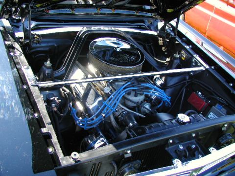 1967 Ford Ranchero - Engine bay of a 1967 Ford Ranchero, showing the V8 engine with chrome accents.
