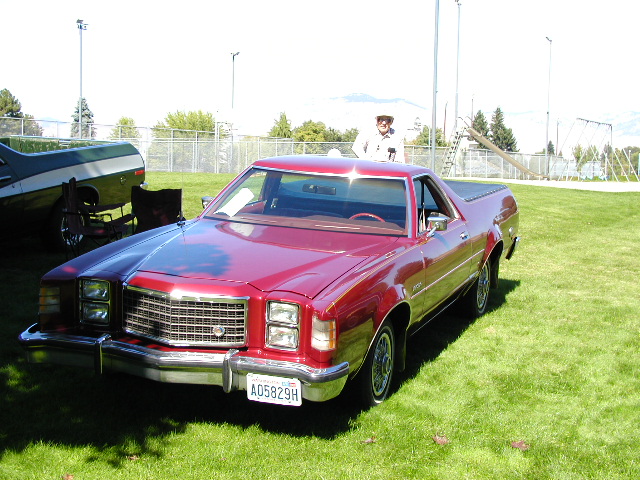 Maroon late-1970s Ford Ranchero car-pickup at an outdoor car show