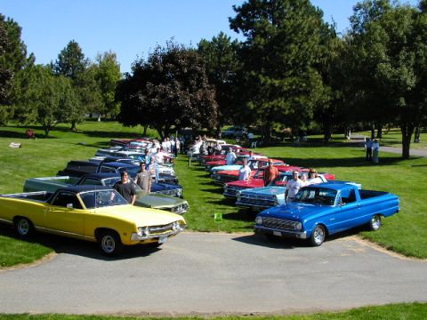 1967 Ford Ranchero - A gathering of Ford Rancheros and other classic vehicles parked on a sunny day.