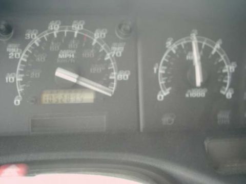 1992 Ford Bronco - The odometer shows 105,289.5 miles on the dashboard gauges.