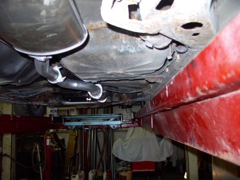 1990 Lincoln Town Car - As you can see there is an offset to match up with the stock muffler. I ran 2 1/4" all the way into a muffler with a 2 1/4" inlet and a 2"…