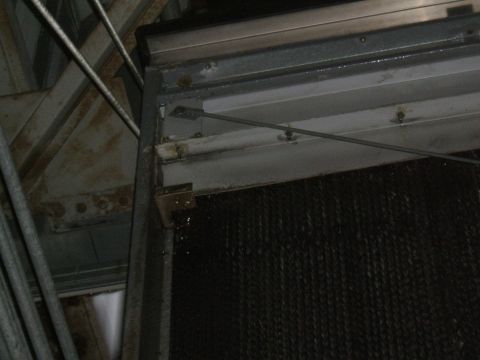 1998 Ford Taurus - Detail of a cooling system component, possibly a radiator or part of a cooling tower.