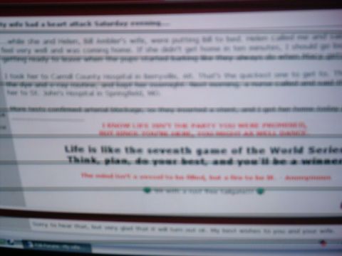 1986 Ford Bronco - A blurry photo of a computer monitor showing a web forum post about a family medical emergency, with a red signature block and a bold line…
