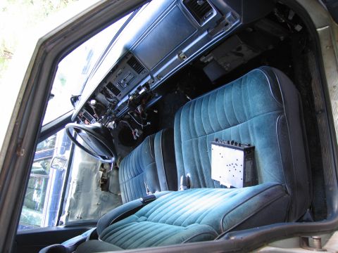 1991 Ford LTD Crown Victoria - Interior view of a 1991 Ford Crown Victoria LTD with dashboard removed and seats visible.