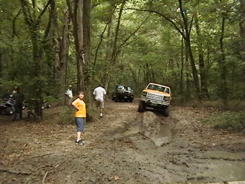 1986 Ford Bronco - Off-roading in the woods with a 1986 Ford Bronco tackling a mud pit.