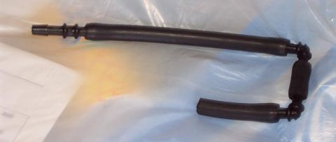 1985 Ford LTD Crown Victoria - A vacuum hose assembly, likely for an automotive application, is shown against a white and blue background.