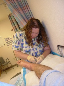 1993 Ford Bronco - Medical staff attending to a patient's leg in a hospital setting.