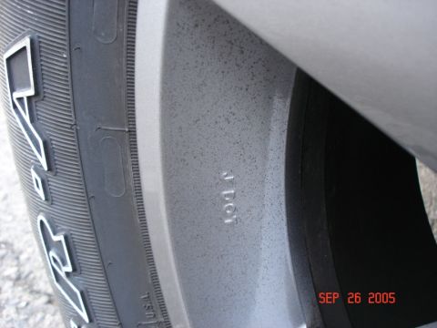 2005 Nissan Titan - Close-up of a tire and wheel, with a date watermark from 2005.