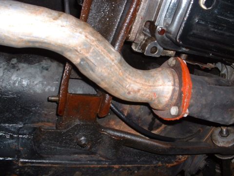 1978 Ford Mustang II - This photo shows a close-up view of a vehicle's exhaust system connection.