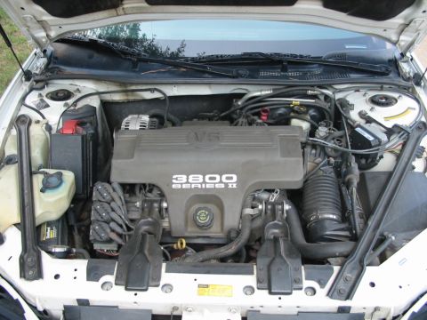 1997 Pontiac Grand Prix - The engine bay of a car, the 3800 Series II V6 engine cover.