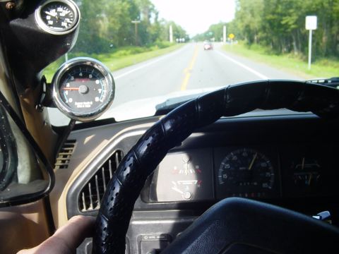 1989 Ford Bronco - Interior view of a 1987 Ford F-150 dashboard, showing gauges and steering wheel.