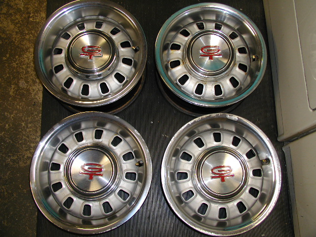 Set of four Driver quality Trim Rings and GT Center Caps