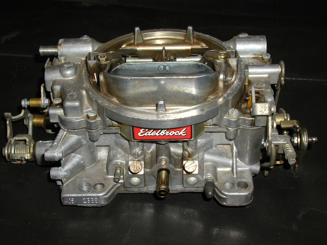 Edlebrock Performer 600 CFM 4bbl carb 
Model 1405 Manual Choke