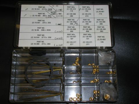1967 Ford Ranchero - This organizer contains various small metal parts, possibly fasteners or washers, sorted into compartments.