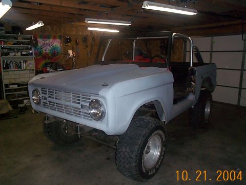 1974 Ford Bronco - This Ford Bronco is undergoing restoration, with its body prepped for paint and a roll cage fitted.