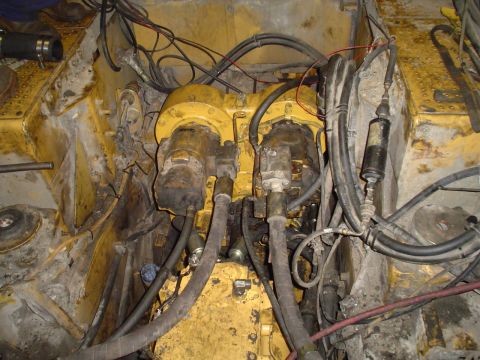 1966 International School Bus - Close-up view of a complex engine compartment with numerous hoses and electrical wires.