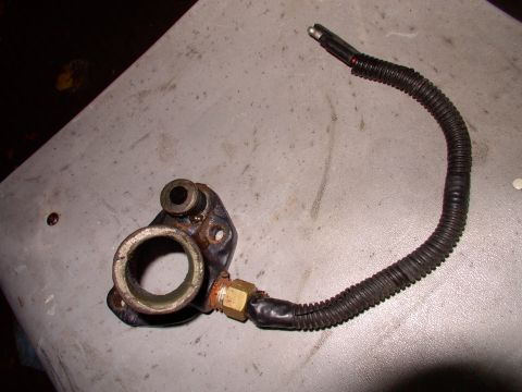 1990 Lincoln Town Car - I grabbed a replacement T-stat housing, with a threaded provision for the sensor, for $18 CDN. After sticking in the sensor, and soldering…
