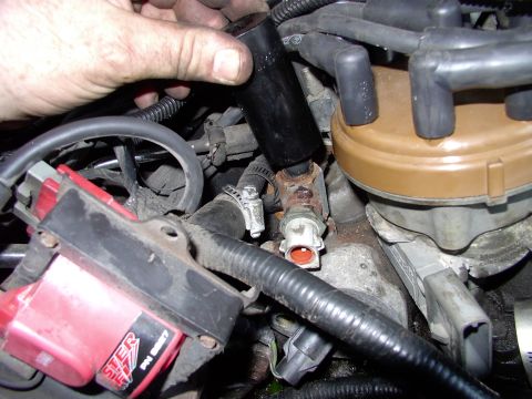 1990 Lincoln Town Car - The stock temp sensor was clocked right over the T-stat housing. Using a 1" deep socket I just tightened the stock temp sensor tower so it…