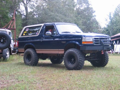 1995 Ford Bronco - This modified 1995 Ford Bronco features large off-road tires and a custom front bumper.