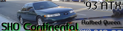 1993 Ford Taurus - This 1993 Ford Taurus SHO Continental is being transported on a flatbed truck.