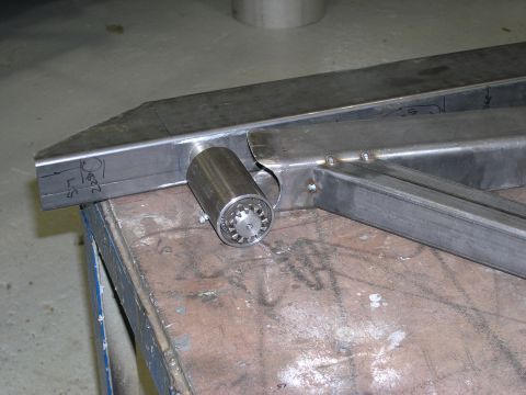 2001 Jeep Wrangler - A close-up view of a fabricated metal component with a geared fitting attached.