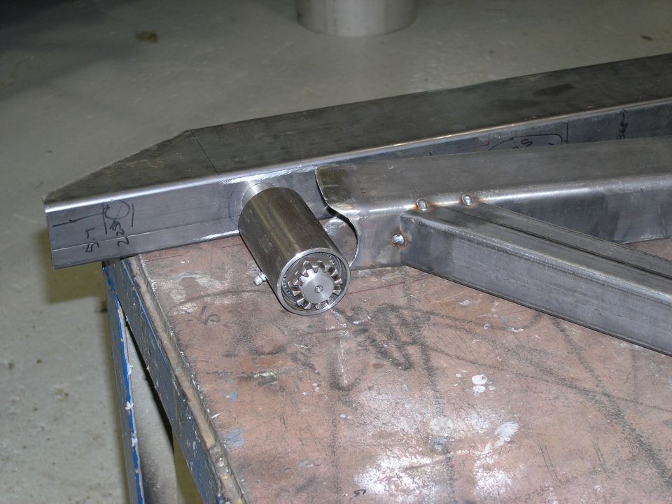 Metal tube with a cylindrical fitting welded on, some markings on the tube