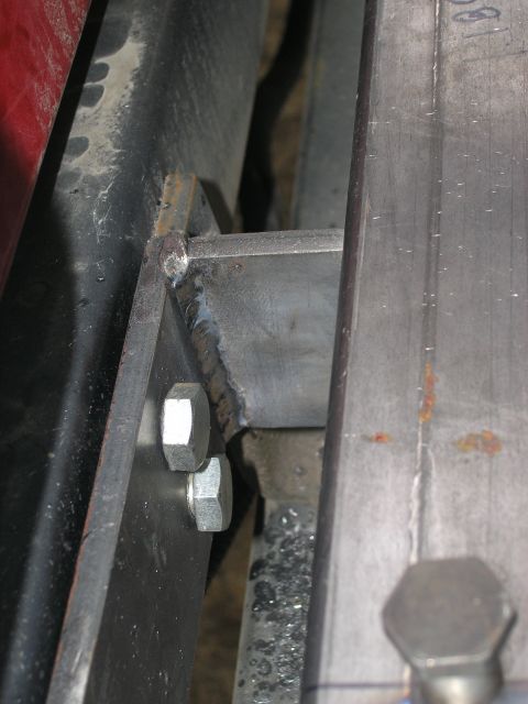 2001 Jeep Wrangler - Custom metal bracket assembly with visible welds and fasteners.