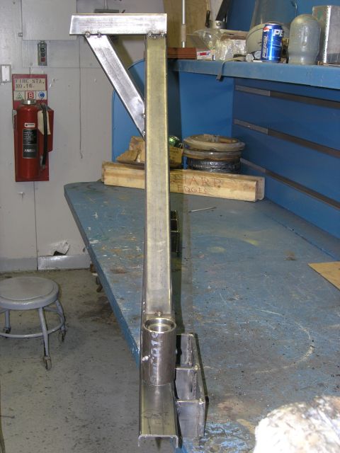 2001 Jeep Wrangler - A custom-fabricated metal bracket, possibly for automotive use, is shown with a visible serial number.