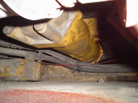 1966 International School Bus - Close-up view of engine components and hoses, with a watermark from Supermotors.net.