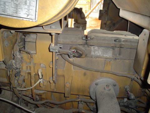 1966 International School Bus - This is a close-up view of a heavy-duty engine, likely from construction or industrial equipment.