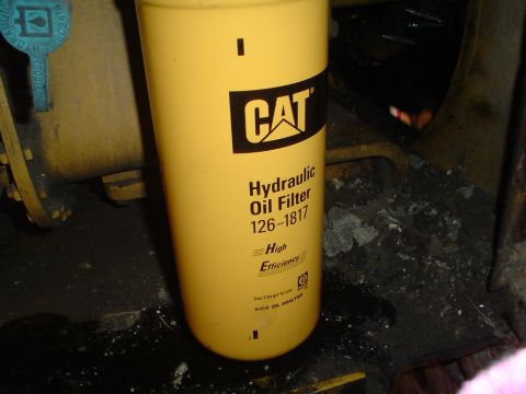 1966 International School Bus - A close-up of a CAT hydraulic oil filter, part number 126-1817, is shown in this image.