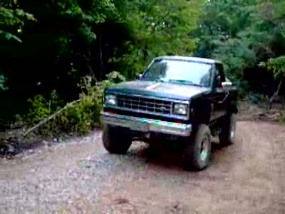 1985 Ford Bronco II - driving over small hill