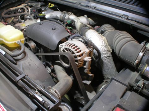 2000 Ford Excursion - OEM alternator. RIP after 155,686 miles.