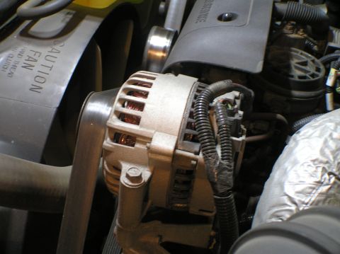 2000 Ford Excursion - OEM alternator. RIP after 155,686 miles.